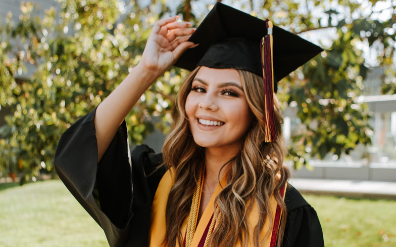 A female celebrating her bachelors degree